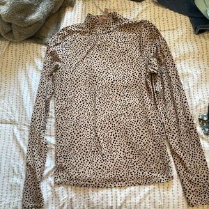 Tight fitting mock neck top